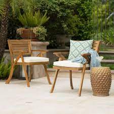 Sling chairs are made of waterproof fabric stretched across a wood or steel frame. Noble House Hermosa Teak Removable Cushions Wood Outdoor Dining Chair With Cream Cushions 2 Pack 7244 The Home Depot
