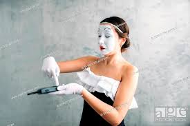 mime female artist performing with