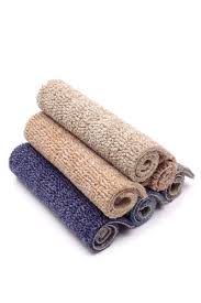 carpet rolls colorful stock photo by
