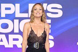 olivia wilde wears baring gown
