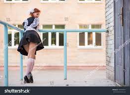 Beautiful Redhead Girl Bends Over Short Stock Photo 705659644 | Shutterstock