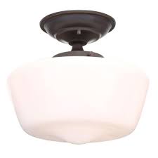 Having integrated lighting in your kitchen is a great way to show off your favorite dinnerware, behind glass doors or in drawers. Hampton Bay Esdale 12 In 1 Light Oil Rubbed Bronze Semi Flush Mount Sf230 The Home Depot