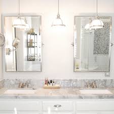 Debbie Albrethsen Interiors On Instagram Pendant Lights Over Vanities Are A Favorite Of Min Bathroom Hanging Lights Bathroom Lighting Design Bathroom Pendant
