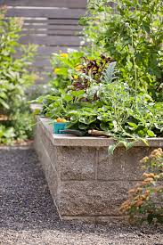 Many gardeners love the look of raised garden beds made of stone. The Basics Of Organic Gardening In Raised Garden Beds Better Homes Gardens