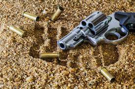gray revolver pistol gun trail blur