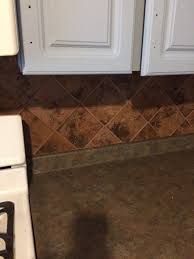 refinishing a tile kitchen backsplash