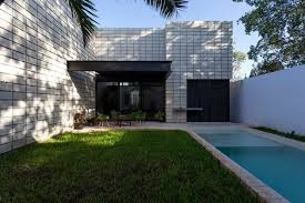C Shaped Concrete Block Home Wraps