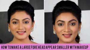 make a large forehead appear smaller