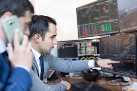Businessmen Trading Stocks Online Stock Brokers Looking At Graphs