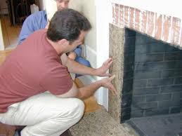 reface a fireplace with stone veneer