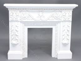 miniature white victorian fireplace