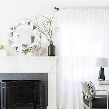 White Fireplace Mantle With Gray Stone