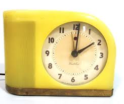westclox yellow bakelite moonbeam clock