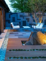 Tamaishi boulders are in fact water worn because of the wet and rainy enviroment in japan good garden design included a bridge (hashi). Modern Japanese Garden Design Mylandscapes Garden Designers London Uk