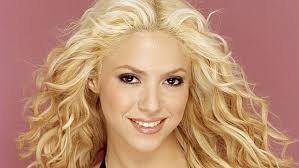 Shakira looks colombian, many if not most colombians have european origin like she does, they're her natural hair color is dark brown, though; Hd Wallpaper Woman S Face Shakira Hair Haircut Smile Blond Hair Women Wallpaper Flare