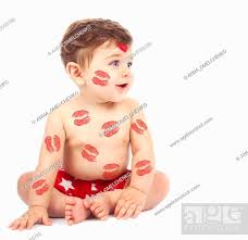 image of adorable child with red kisses