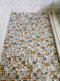 install glass mosaics on shower floor