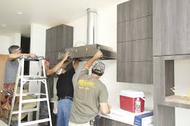 the restaurant grade vent hood for this custom home pulls 600 cfm from the kitchen
