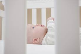 cot safety features sleeping safely in