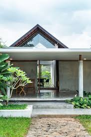 a lush modern tropical house in kerala