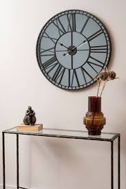 Libra Black Skeleton Mirror Wall Clock