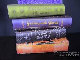 Get your book of shadows or a piece of paper. Make Your Own Spell Books Using Scrapbook Pages To Cover Books Great Idea For Halloween Decorating Halloween Spell Book Halloween Scrapbook Halloween Books