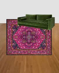 green couch and pink rug