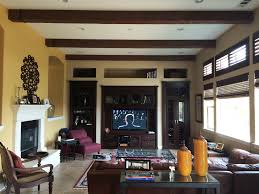 living rooms with faux wood beams