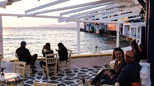 Looking out over the beach bays of ornos or psarou, the phenomenon has created what looks like a parking lot for the many plush vessels designed for posh travel on the water. Coronavirus Greece Has Shut Down Bar Owners At Tourist Hotspot Hit With Curfew After Covid 19 Spike World News Sky News