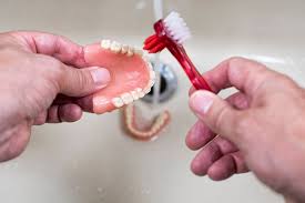 denture care what type of toothbrush