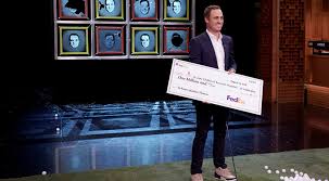 justin thomas holds a 1 million check that fedex will donate to st jude children apos