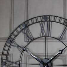 large black iron skeleton wall clock