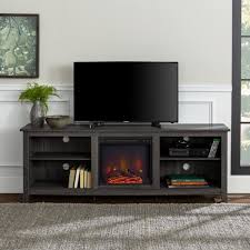 You'll find stands for 60, 63, 64, 65, 82, 85 and 92 flat screen tvs. Walker Edison Furniture Company 70 In Wood Media Tv Stand Console With Fireplace Charcoal Hd70fp18cl The Home Depot