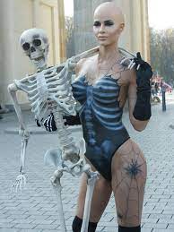Is this sexy Halloween outfit the best yet? Model Micaela Schafer paints  her naked body as a skeleton - Irish Mirror Online