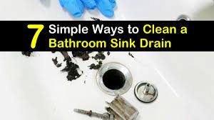 to clean a bathroom sink drain