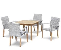 He put his coat over the back of the chair and sat down. Sandringham Square Garden Table And 4 St Tropez Stacking Chairs Set