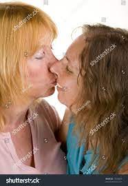 Young and old lesbians kissing