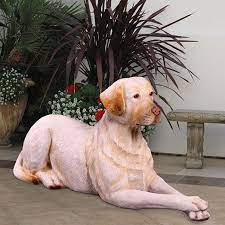 resting yellow lab statue 46in l