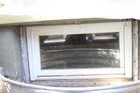 My Basement Window With Wood Frame Is