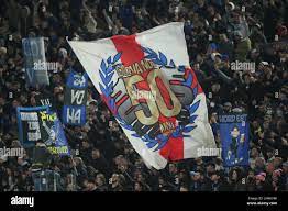 Rome, Italy. 04th Dec, 2021. ROME, Italy - 04.12.2021: INTER FANS FLAGS in  action during the Italian Serie A football match between AS ROMA VS INTER  MILAN at Olympic stadium in Rome.