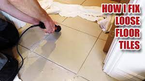 fixing loose floor tiles and why they