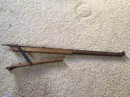 antique carpet stretcher tool