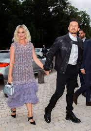 The couple is currently on vacation in hawaii and orlando dressed. Katy Perry Orlando Bloom Look Dashing At The Louis Vuitton Show In Paris About Her