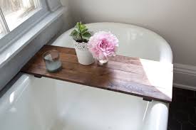 The first step is to simply purchase a piece of lumber large enough to fit your tub and hold all of your. Amazon Com Rustic Tub Caddy Wooden Bathtub Tray Walnut Wood Bath Caddy Farmhouse Decor Handmade Handmade