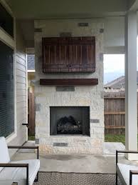 Outdoor Fireplace With Tv Cabinet In