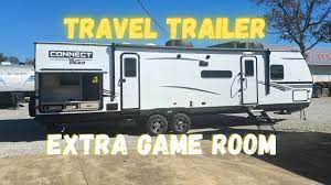 travel trailer with game table in bunk