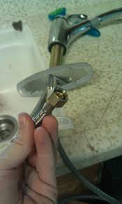 installing new faucet in kitchen sink