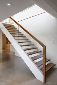 The glass even allows architecture and design to come through and doesn't block the views. Home Design Beautiful Home Ideas With Glass And Wooden Staircase Design Stairway Design Wooden Staircase Design Modern Stairs