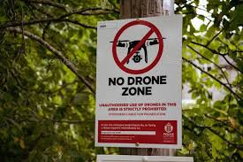 sign board with no drone zone sign