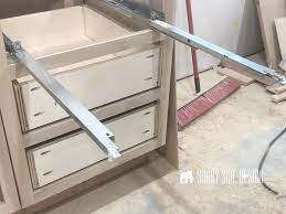 a drawer box with undermount slides